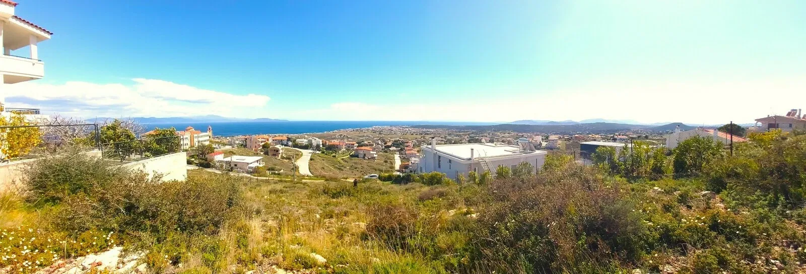 Seaview Land with a Building License for sale in Neos Voutzas. ID A3-3063