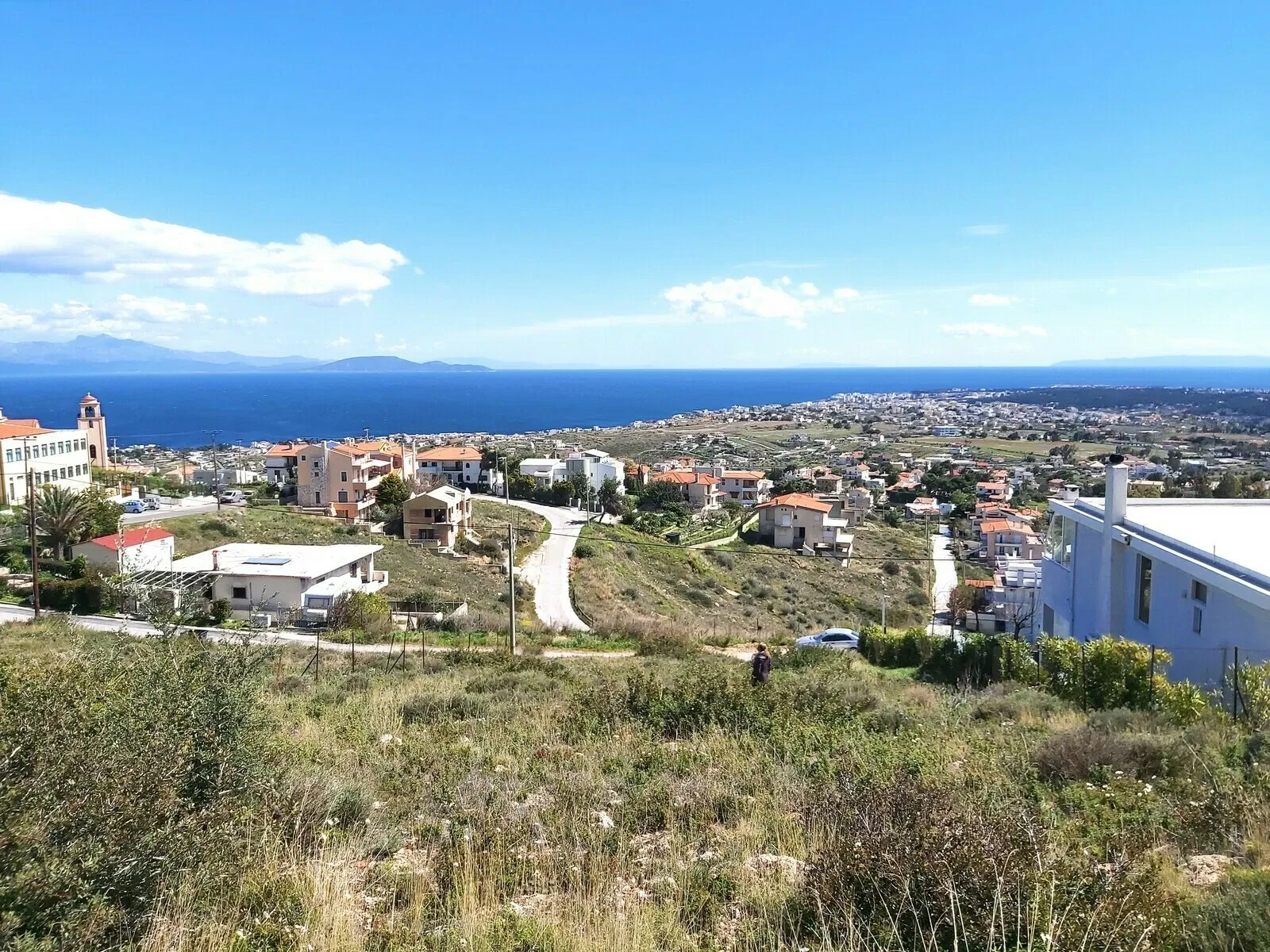 Seaview Land with a Building License for sale in Neos Voutzas. ID A3-3063